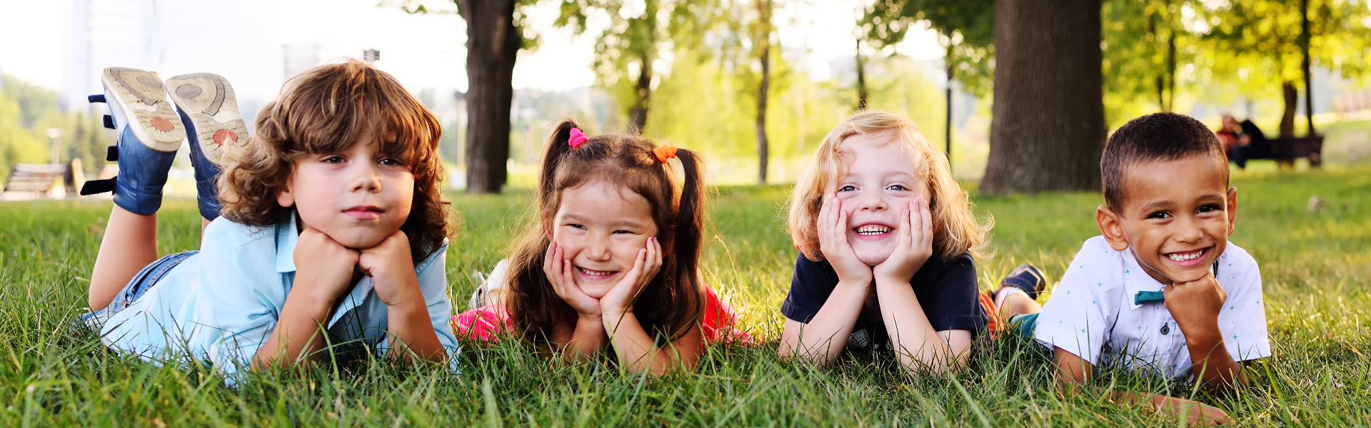 preschool children playing in the Park on the grass